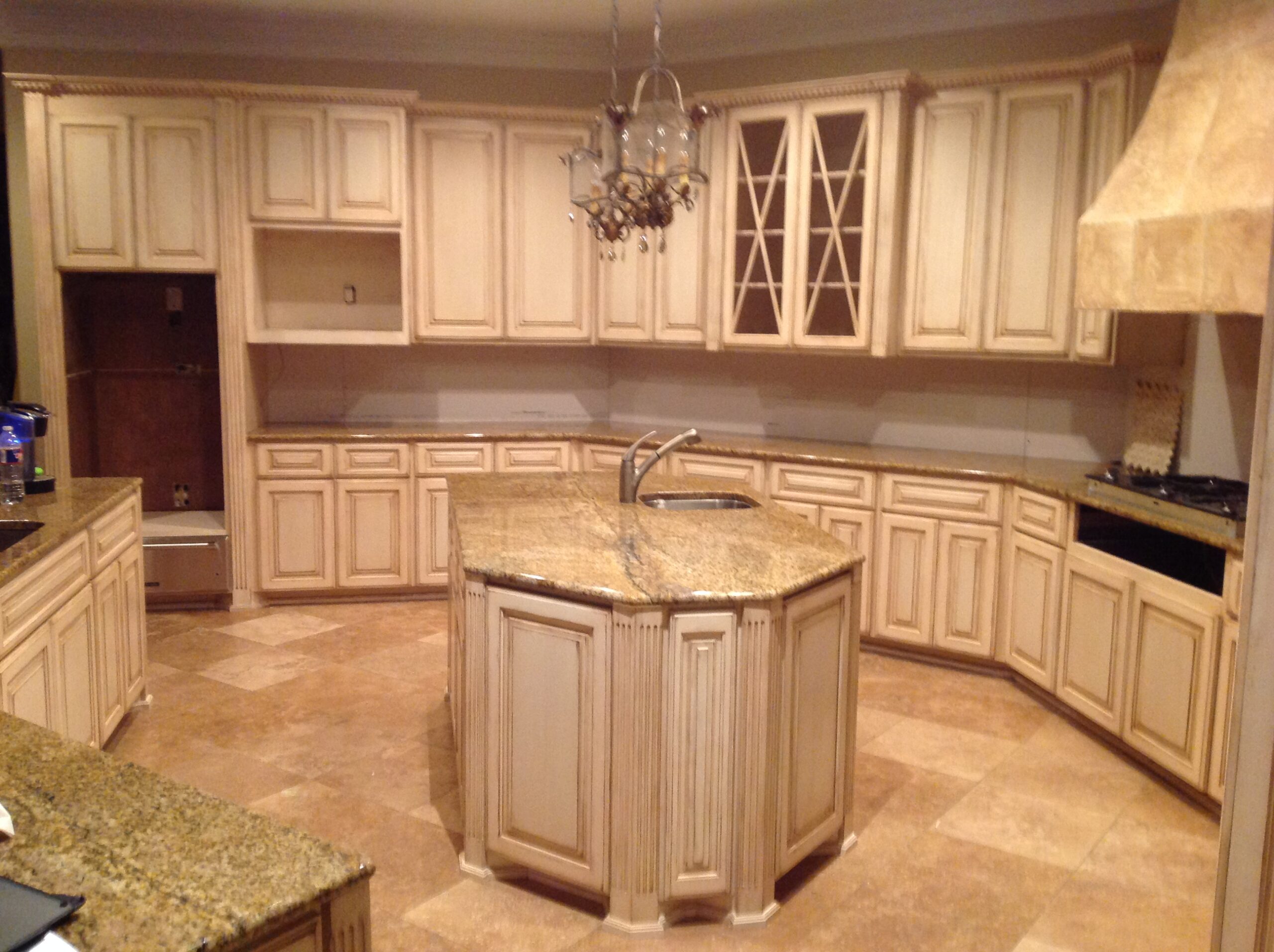 Refaced kitchen cabinets with updated doors and hardware in a bright San Antonio home
