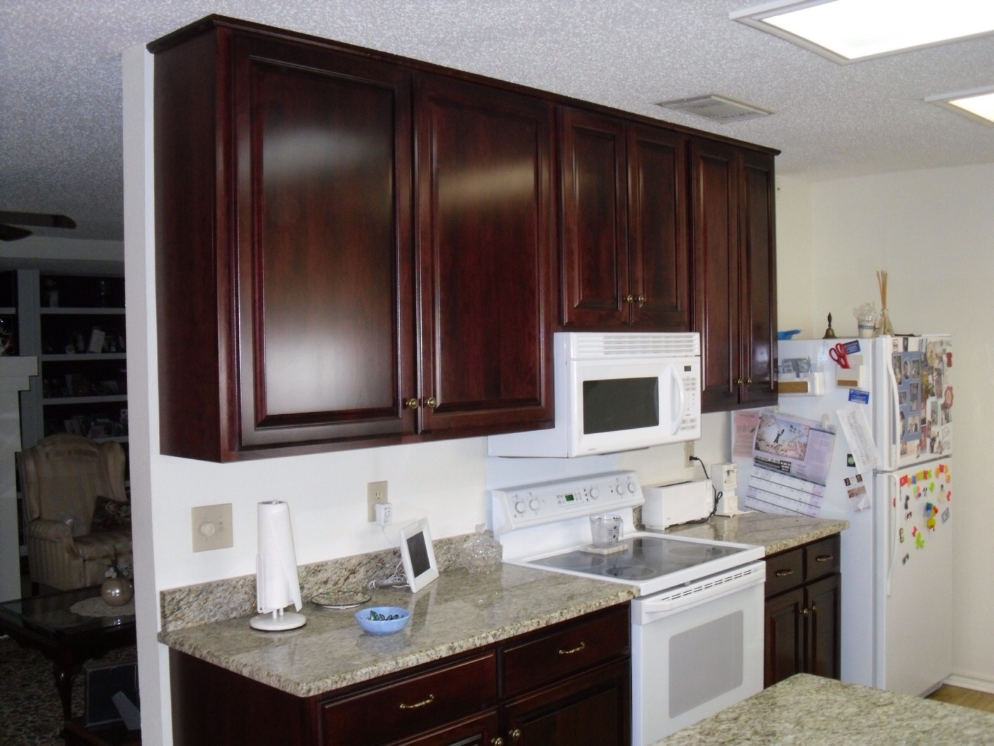 Refaced kitchen cabinets with updated doors and hardware in a bright San Antonio home
